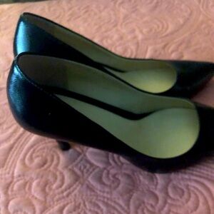 1 pair of gently worn heels. Size 7